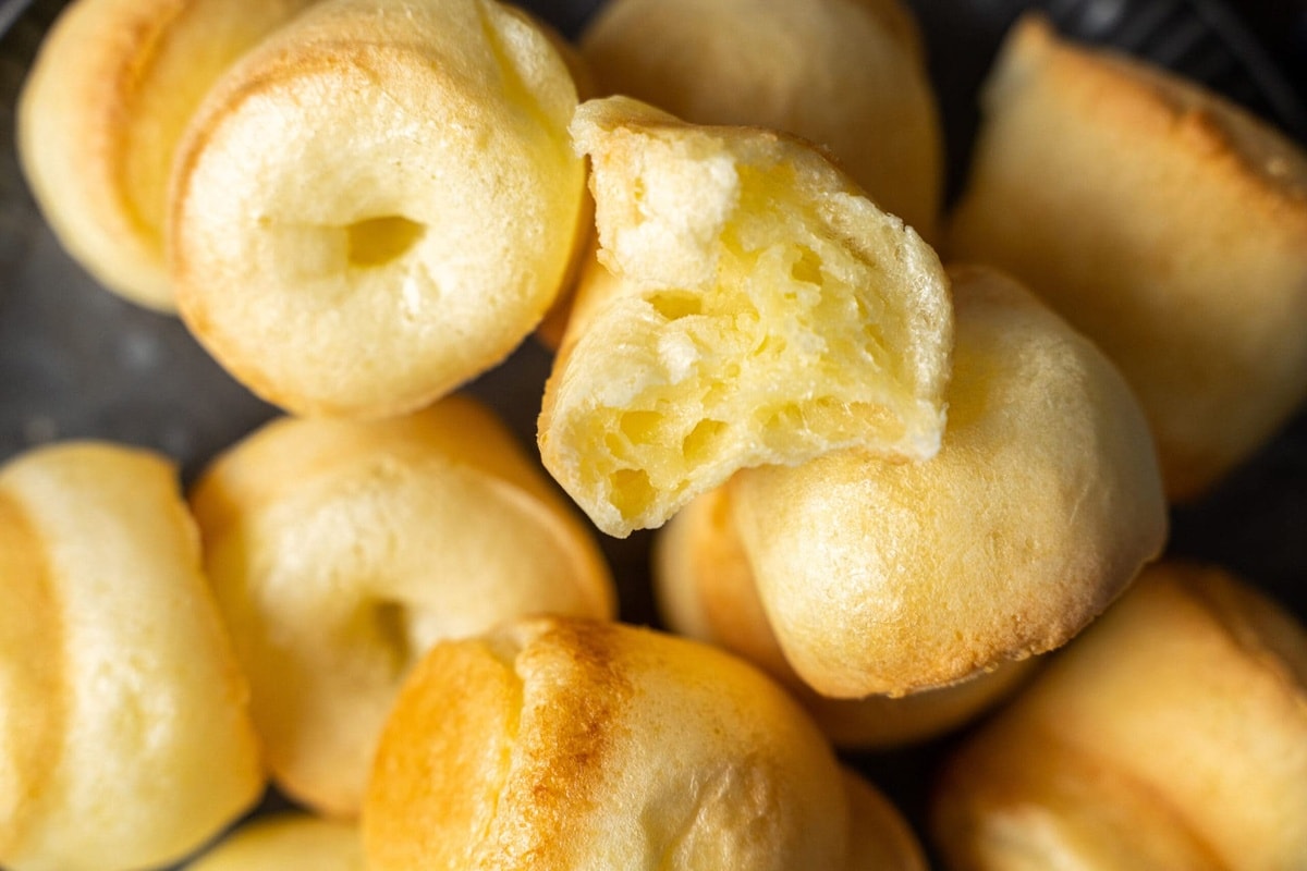 Brazilian cheese bread stacked.