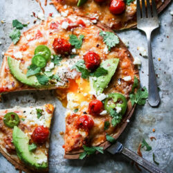 Tortilla breakfast pizza with delicious toppings.