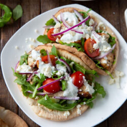 Chicken souvlaki wrap served on a plate.