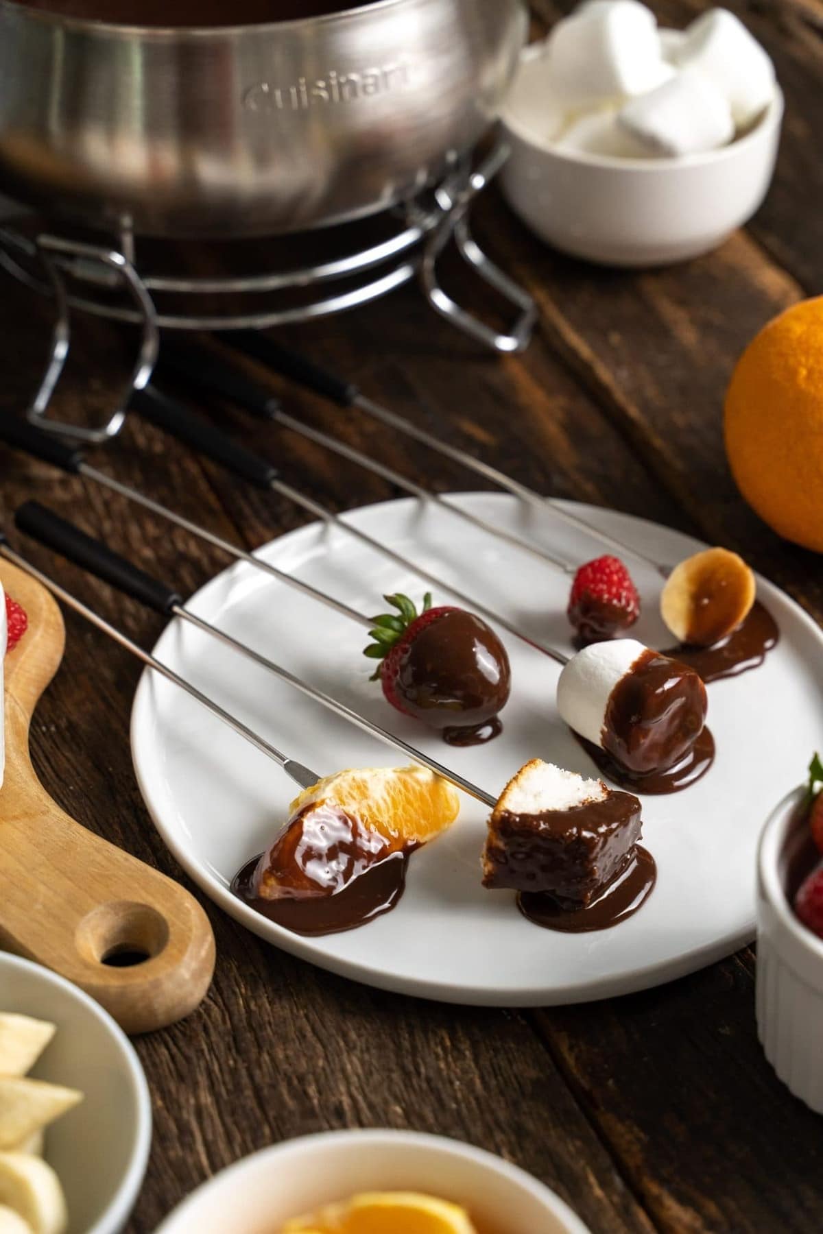 Dippable dipped in our milk chocolate fondue on a white plate.