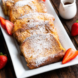 Transform your morning with our Cinnamon French Toast recipe! It's a delightful combination of honey and cinnamon, enhanced with your preferred twist of vanilla, orange, or almond extract.
