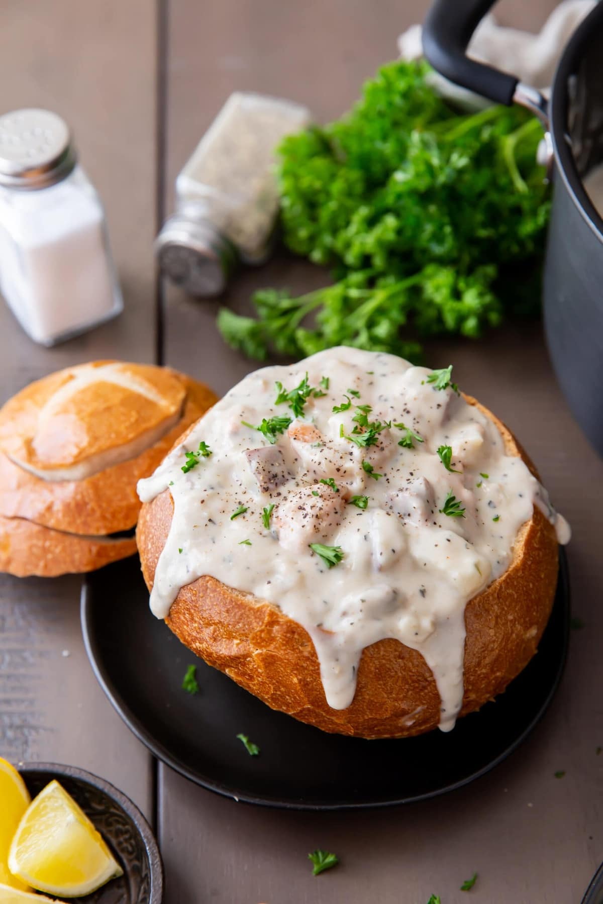 Seafood chowder served in a bread bowl.