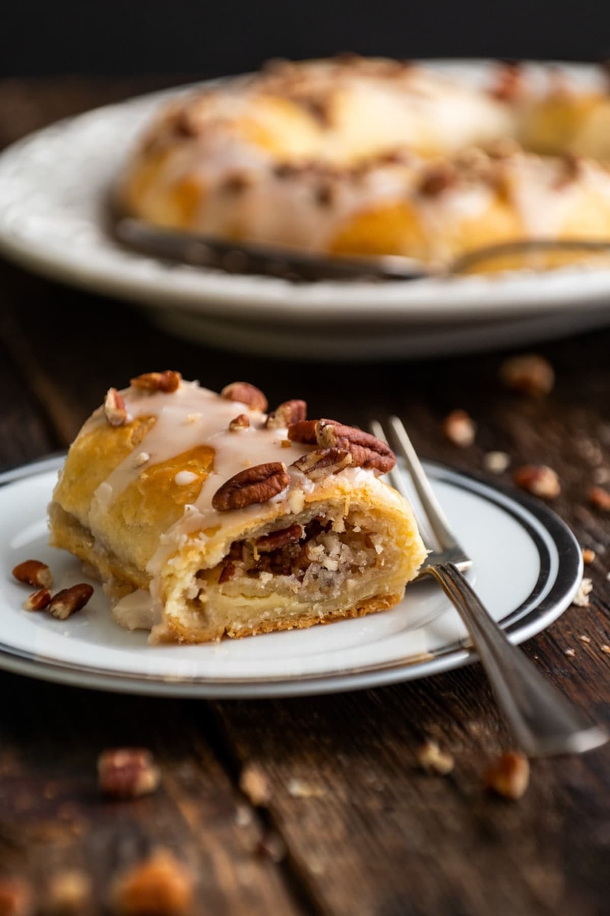 A slice of Danish Kringle served on a plate.
