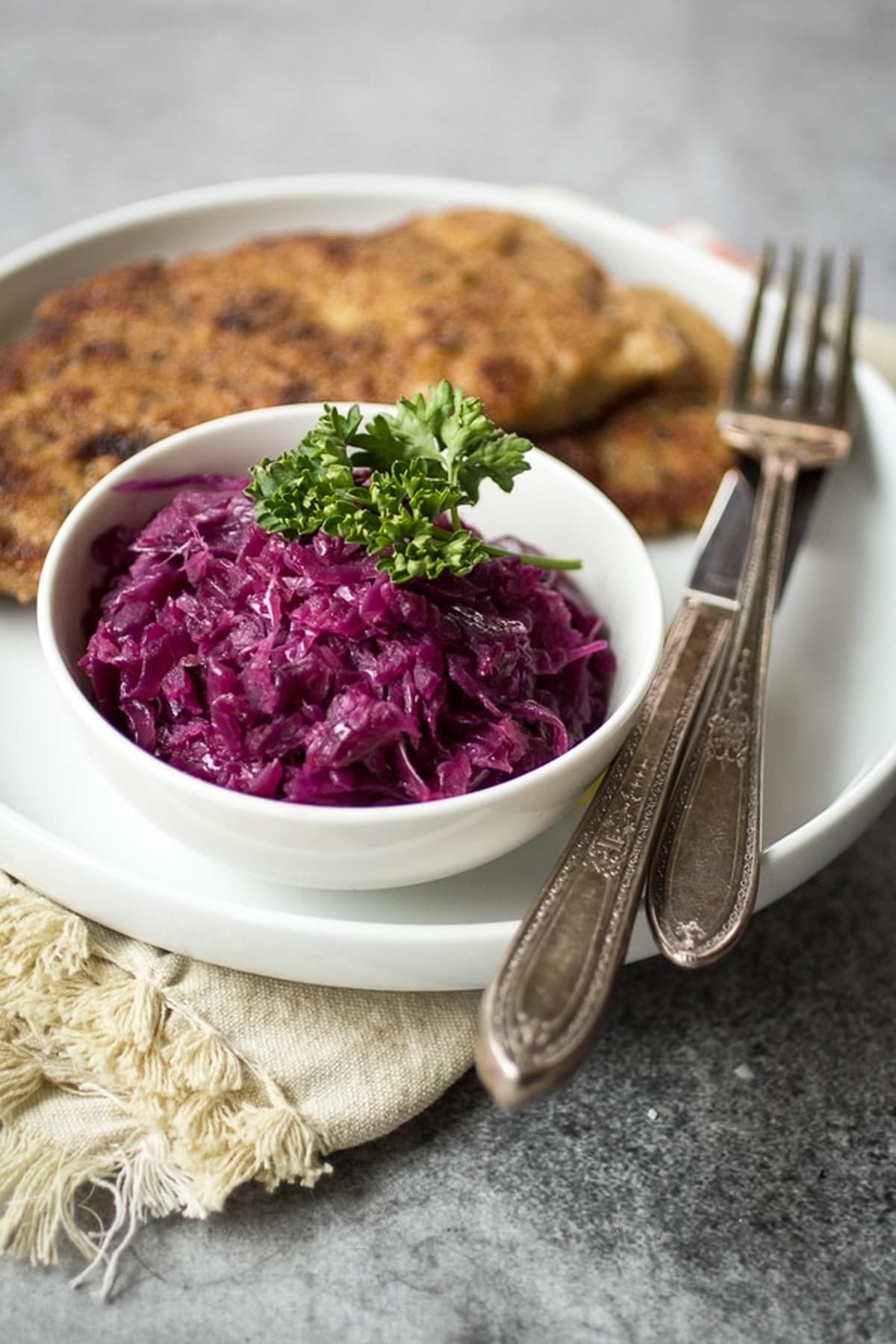 A white plate with German red cabbage.