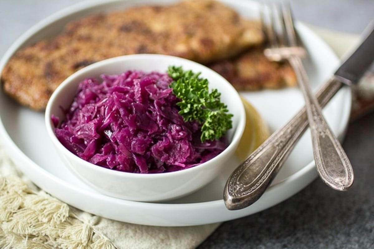 Rotkohl on a plate, served with pork schnitzel.