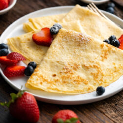 French crepes on a white plate.