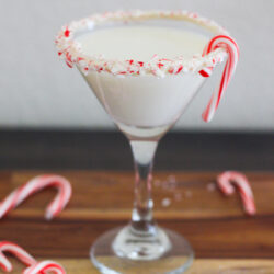 Dive into peppermint bliss with this Candy Cane Martini! A bright and minty cocktail perfect for your next Holiday gathering!