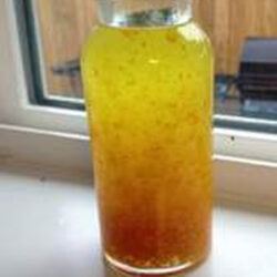 Orange peel extract in a clear bottle.