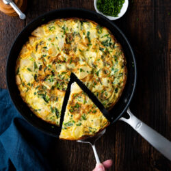 This Potato Frittata recipe is filled with eggs, cheese, spinach, and of course, potatoes. It's a great way to start your morning with a savory breakfast!