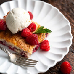 Indulge in this Raspberry Cobbler recipe. It's filled with sweet, juicy raspberries, and topped with a perfect golden crust to make a fresh and flavorful dessert.