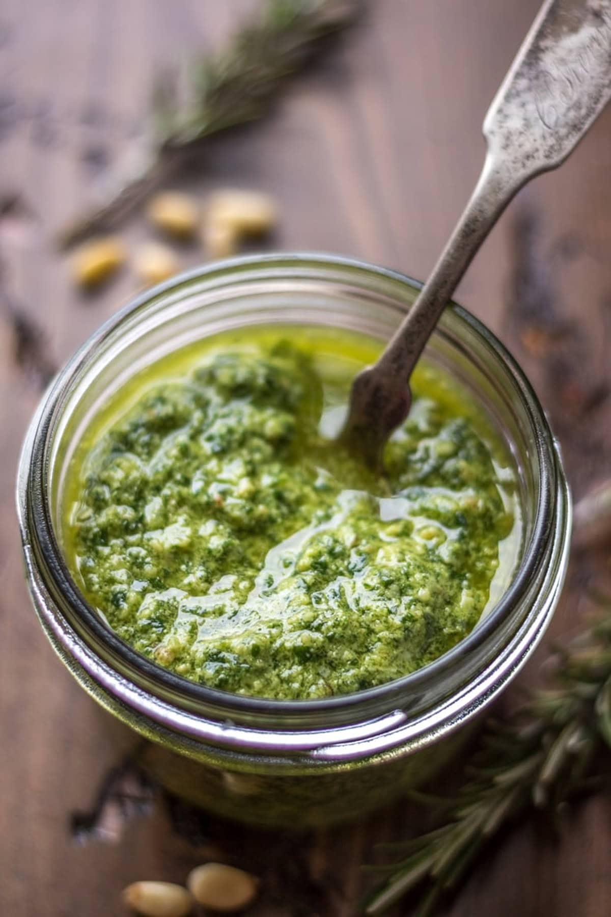 Arugula pesto with rosemary in a jar.