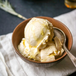 Rosemary and olive oil ice cream served in a bowl.