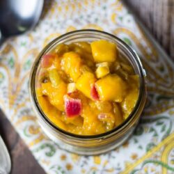 Mango chutney in a jar.