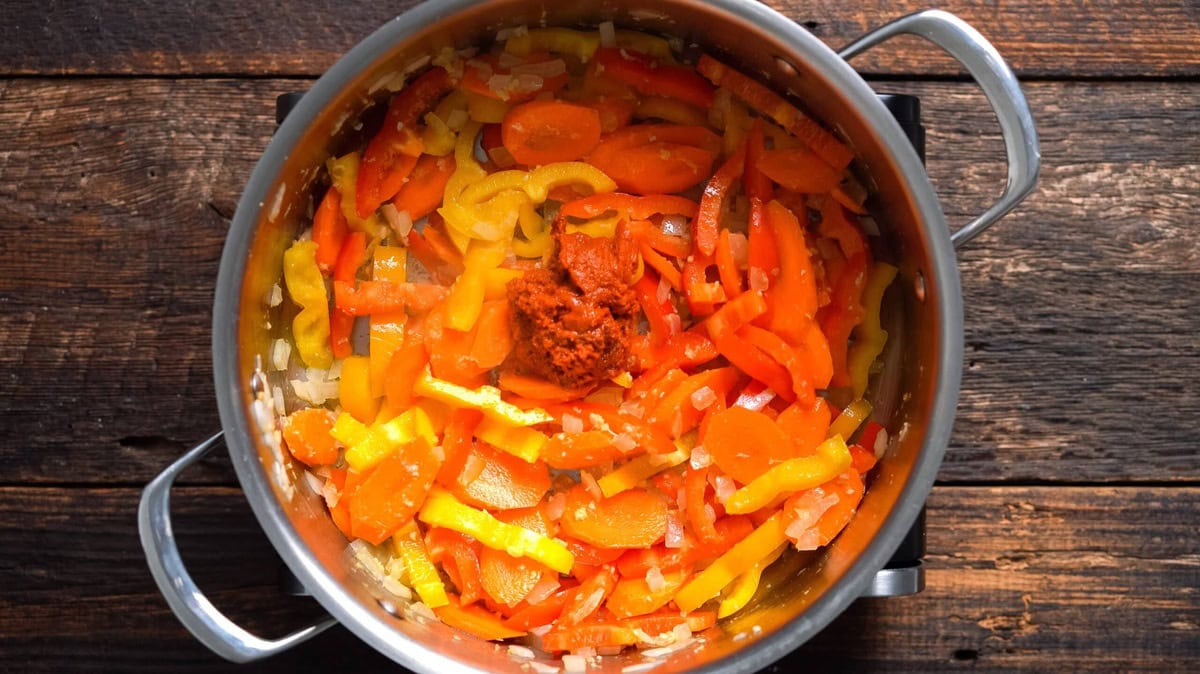 Added curry paste to the skillet.